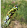 Reserved – Green and orange salamander on a silvered ivory bead – tiny flowers – Glass animals