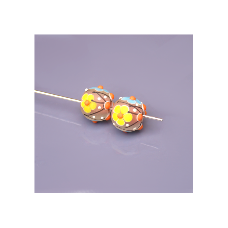 Pair of floral-patterned ronde beads – frosted glass