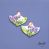 Pair of enameled copper earring charms – green and pink background – foliage, purple flower, ivory