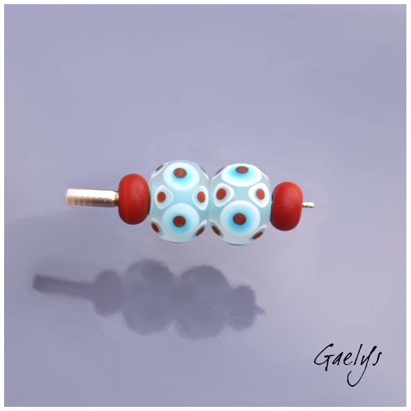 "Frosted" Lampwork Beads – pair of round beads – sky-blue background, white, turquoise, and red dots – frosted glass