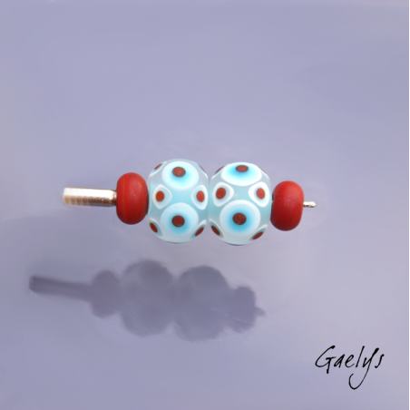 "Frosted" Lampwork Beads – pair of round beads – sky-blue background, white, turquoise, and red dots – frosted glass