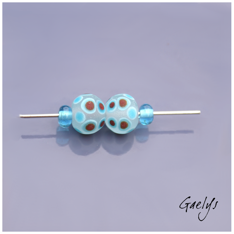 "Frosted" Lampwork Beads – pair of round beads – clear base, white, turquoise, and red dots – frosted glass