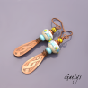 Claris – ivory, turquoise, and yellow lampwork earrings – etched copper interlace design