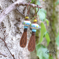 Claris – ivory, turquoise, and yellow lampwork earrings – etched copper interlace design