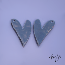 Pair of enameled copper earring charms – Heart shape; green, pink, and sky-blue background; pink and aqua-blue flowers.