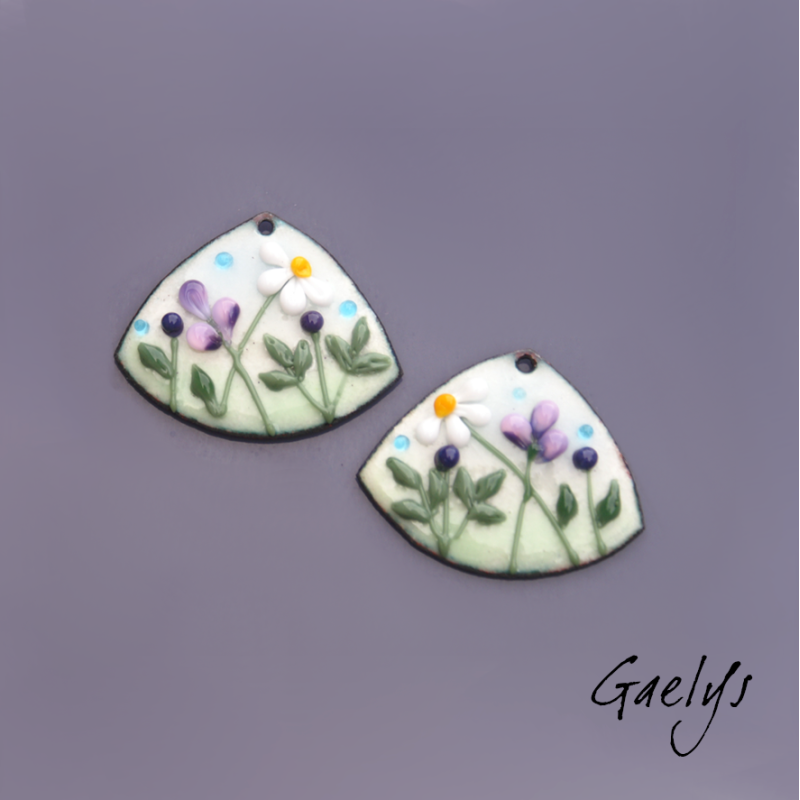 Pair of enameled copper earring charms – sky-blue and soft green background, foliage, purple flower, daisy.