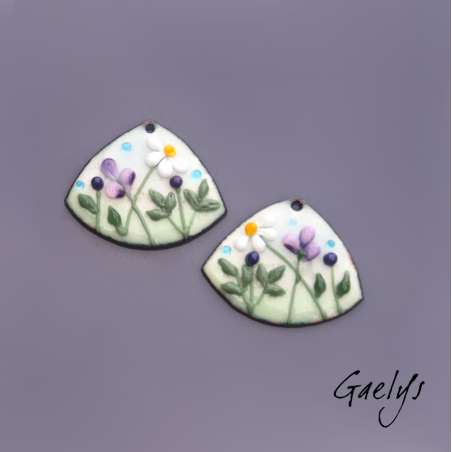 Pair of enameled copper earring charms – sky-blue and soft green background, foliage, purple flower, daisy.