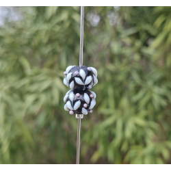 Perles Lampwork à fleurs - duo de perles rondelle  - fond noir /feuillage olivier