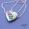 Perle Coeur fond vert doux décor champêtre