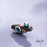 Garette - Salamandre bleue turquoise sur perle noir lave (légerement métalisé / brut) - fleurettes - Animaux de verre