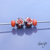 Perles Lampwork à fleurs - duo de perles ronde + spacer  -  ivoir / feuillage noir / fleurette rouge et orange