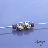 Perles Lampwork à fleurs - duo de perles ronde + spacer  -  ivoir / feuillage vert / fleurette violette