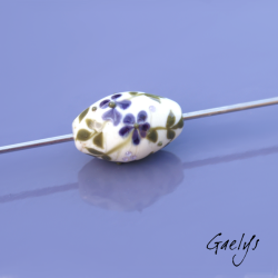 Pearl ivory background with olive green foliage and purple flowers
