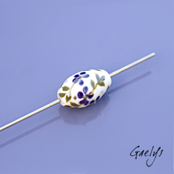 Pearl ivory background with olive green foliage and purple flowers